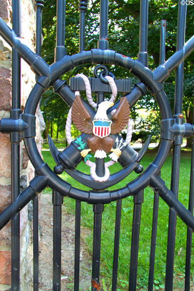 Iron gate given (1928) by the White House with American eagle on anchor with cross canons at Hayes Presidential Center. Fremont, OH.