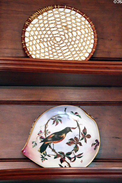President Rutherford B. Hayes China plates with Indian basket pattern for cheese & oriole painting by Haviland at Hayes Presidential Center. Fremont, OH.