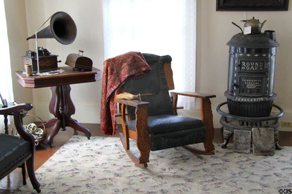 Gramophone, rocking chair & Round Oak stove (1896) in Seymour House at Historic Lyme Village Museum. Bellevue, OH.