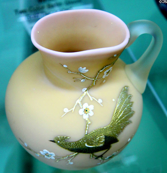 Sandwich Fireglow creamer with bird decoration by Boston & Sandwich Glass Co. at Milan Historical Museum. Milan, OH.