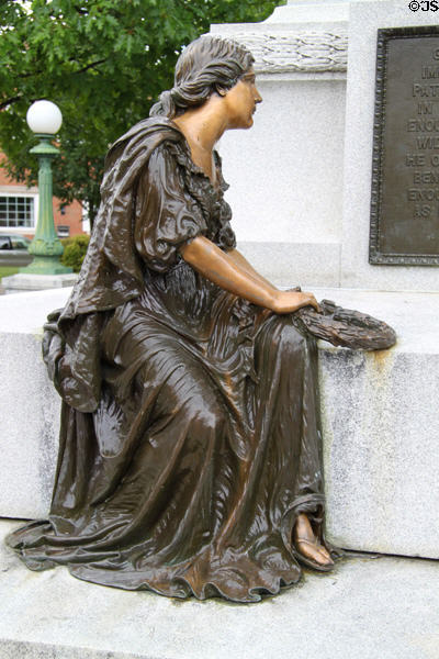Mourning figure in bronze at base of William Harvey Gibson Monument. Tiffin, OH.