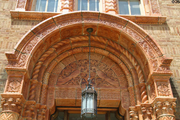 Carved entrance arch & hanging lamp of 41 Madison St. Tiffin, OH.