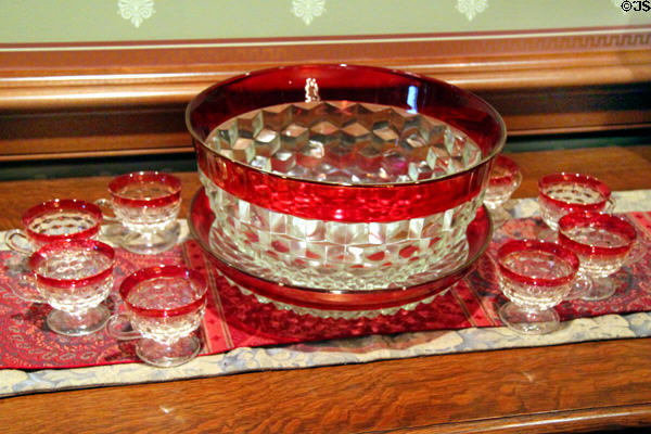 Punch bowl & cups with ruby glass trim at Ida Saxton McKinley Historic House. Canton, OH.