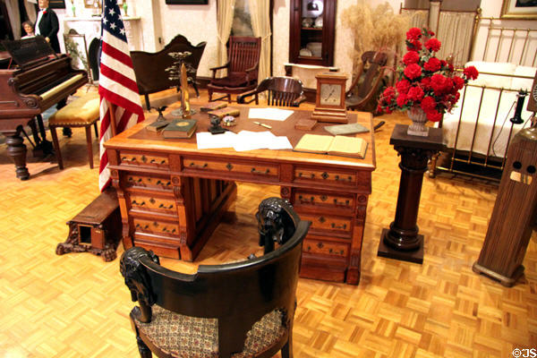 Partner's desk and carved armchair, furnishings at McKinley White House at William McKinley Presidential Museum & Library. Canton, OH.