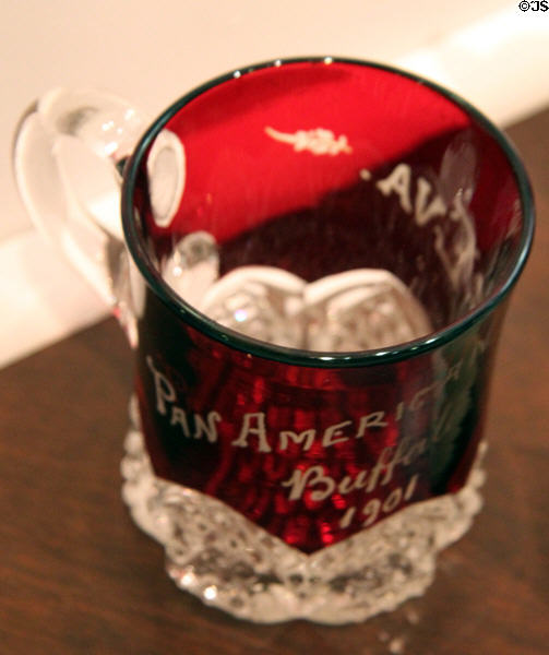 Souvenir red glass cup commemorating the 1901 Pan American Exposition in Buffalo at William McKinley Presidential Museum & Library. Canton, OH.