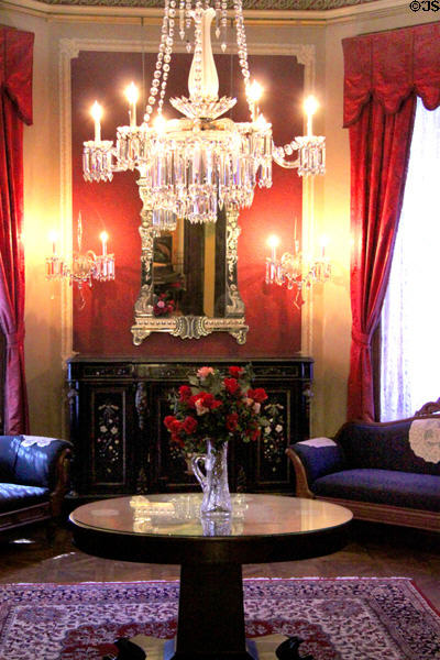 French crystal chandelier, wall sconces & Venetian mirror at Hower House. Akron, OH.