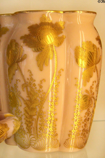 Opaque glass vase with gold flowers at National Museum of Cambridge Glass. Cambridge, OH.