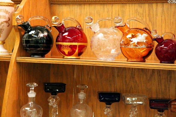 Row of round flasks at National Museum of Cambridge Glass. Cambridge, OH.