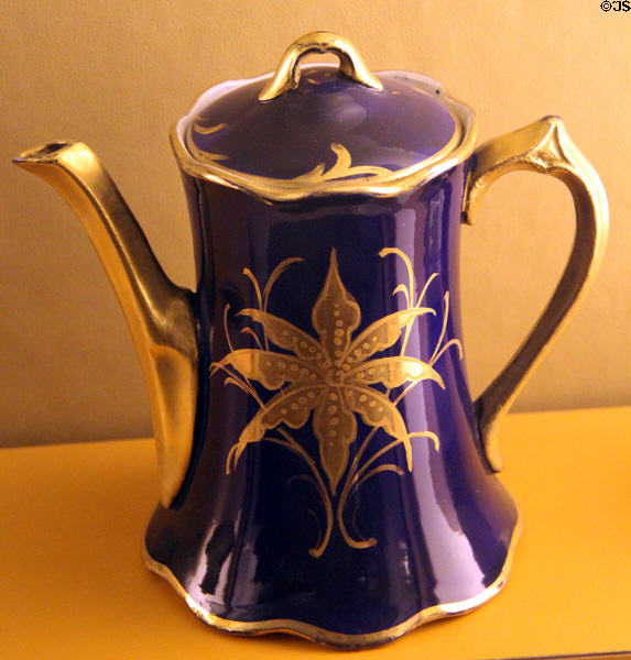 Semi-porcelain Whiteware pitcher in dark blue with gold trim (c1896-1928) by Vodrey Pottery Co. of East Liverpool at Museum of Ceramics. East Liverpool, OH.