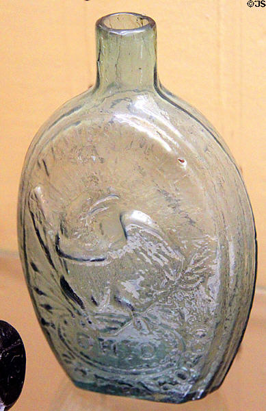 Aqua blown glass flask with American eagle (1822-35) by J. Shepard & Co., Zanesville at Stone Academy Museum. Zanesville, OH.