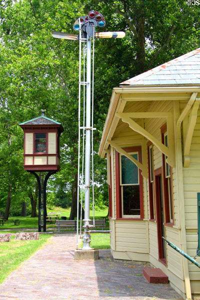 Semaphore signal plus yard switching cabin beside Bowling Green rail station at Carillon Historical Park. Dayton, OH.