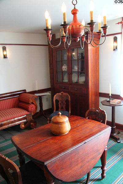 Cabinet & drop-leaf table in parlor of Whitney home at Historic Kirtland Village. Kirtland, OH.