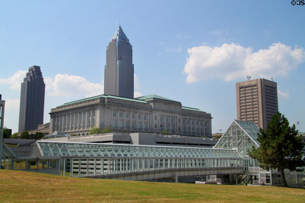 Glass bridge to commuter rail station with Cleveland City Hall plus BP, Key & Justice Center towers beyond. Cleveland, OH.