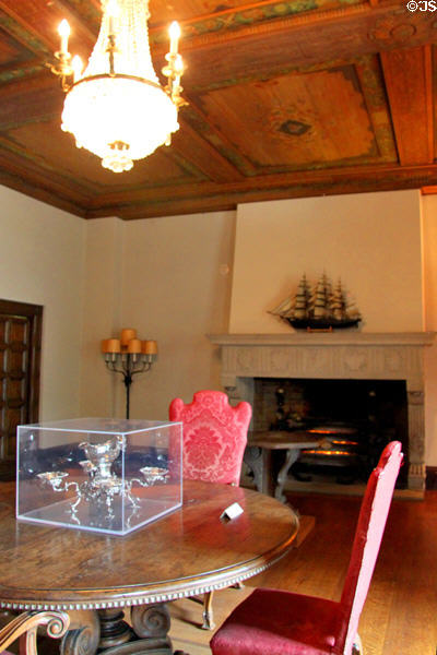 Dining room fireplace & table in Bingham-Hanna Mansion at Cleveland History Center. Cleveland, OH.