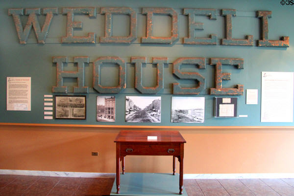 Weddell House hotel sign where Lincoln gave a speech on way to his 1861 inauguration with table used by Lincoln at Cleveland History Center. Cleveland, OH.