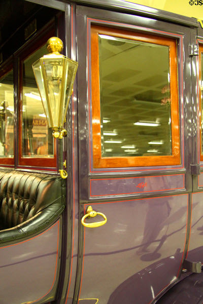 Monogrammed rear door of Studebaker-Garford Model H Landaulet (1907) from South Bend, IN at Crawford Auto Aviation Museum of Cleveland History Center. Cleveland, OH.