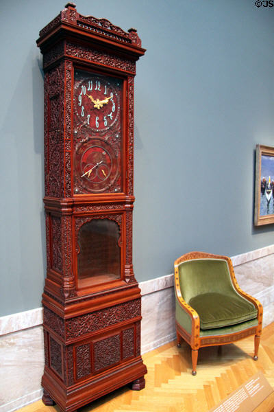 Tall clock (c1880) by Tiffany & Co. & arm chair (c1890) by Tiffany Studios of New York at Cleveland Museum of Art. Cleveland, OH.