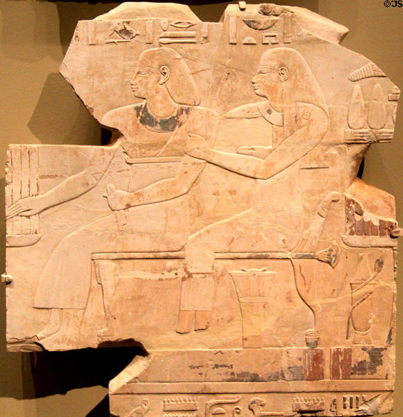 Limestone relief of seated couple: Mentuemhat's Ancestors (667-647 BCE) Egyptian New Kingdom, Dynasty 25-26 from Thebes at Cleveland Museum of Art. Cleveland, OH.