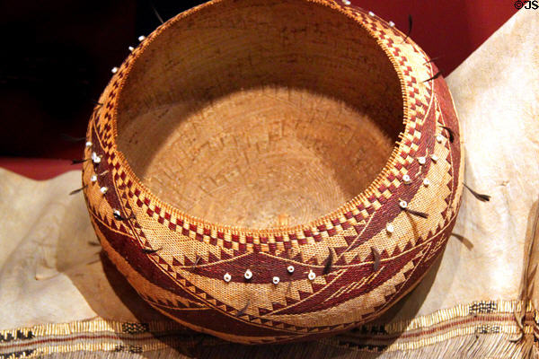 Pomo wedding basket with quail feathers (c1880s) from Northern California at Cleveland Museum of Natural History. Cleveland, OH.