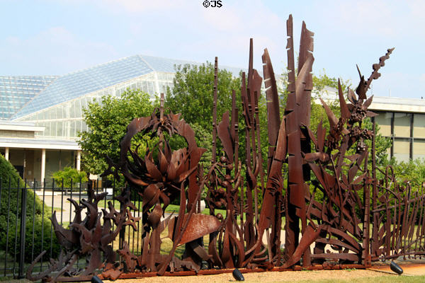 Native plant life Kohl Gate (2004) of Cor-ten steel by Albert Paley at Cleveland Botanical Garden. Cleveland, OH.