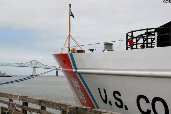 Bow of Coast Guard Cutter Alert & Astoria-Megler Bridge over Columbia River. Astoria, OR.