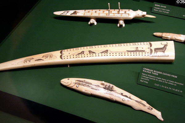 Scrimshaw cribbage boards carved from walrus tusks by Alaskan natives at Columbia River Maritime Museum. Astoria, OR.
