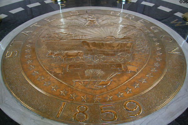 Bronze Oregon State by Ulric Ellerhusen seal inside Capitol. Salem, OR.