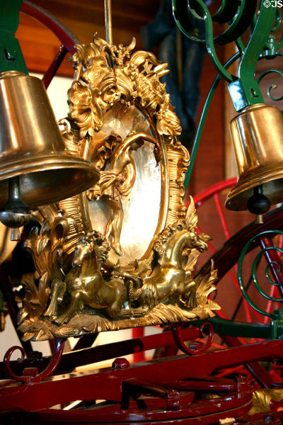 Bells & emblem of spider-type hose carriage in Harrisburg Fire Museum. Harrisburg, PA.