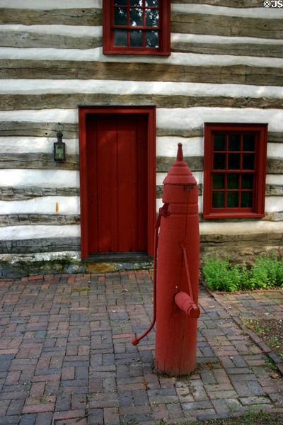 Antique wooded water pump at Plough Tavern heritage complex. York, PA.