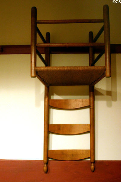 Shaker straight-back chair (c1850-1900) as hung on wall from Shaker community of Mt. Lebanon, NY, at Philadelphia Museum of Art. Philadelphia, PA.