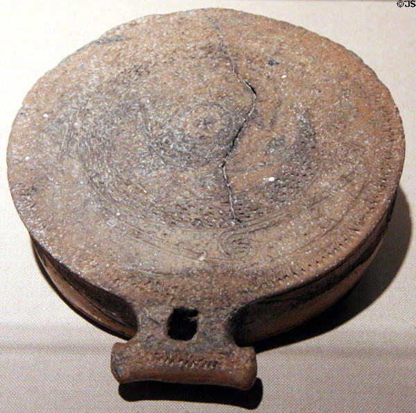 Cycladic terracotta "frying pan" (function unknown) (2700-2200 BCE) from Keros-Syros culture in what became Greece at Carnegie Museum of Art. Pittsburgh, PA.