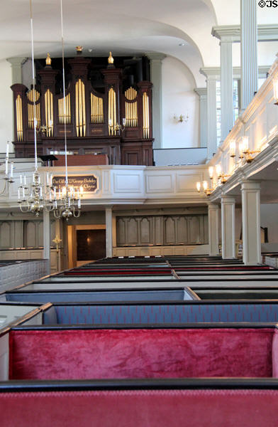 Organ over boxed-in pews at Trinity Church. Newport, RI.