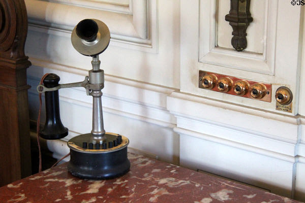 Candlestick telephone with buttons to connect to other extensions & staff call buttons in Mr. Vanderbilt's Bedroom at The Breakers. Newport, RI.