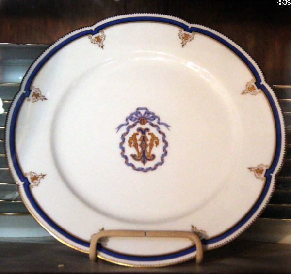 Monogrammed dinner plate (c1880) made for John Wolfe of The Reefs, a Newport mansion destroyed by fire in 1942, at The Breakers. Newport, RI.