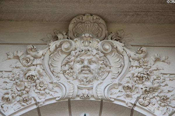 Carved classical face over door arch of entrance to The Elms. Newport, RI.