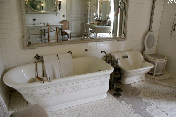 Bathroom at south end of second floor hall with tub, sits bath & throne toilet at The Elms. Newport, RI.