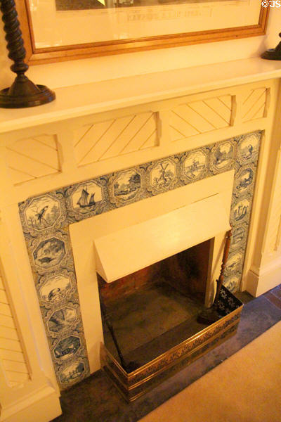 Fireplace surround with Dutch Delft tiles (19thC) in Pink Bedroom at Kingscote. Newport, RI.