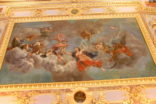 Dining room ceiling painting with Mercury leading a goddess to Mount Olympus to meet Mars holding a shield at Marble House. Newport, RI.