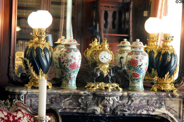 Clock, vases & lamps on Library mantelpiece at Marble House. Newport, RI.