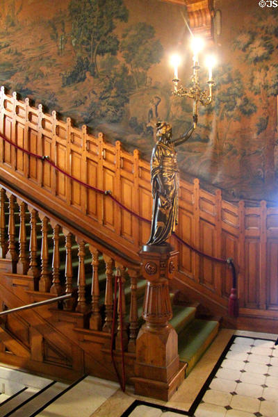 Patinated bronze torchere on Grand staircase at Chateau-sur-Mer. Newport, RI.