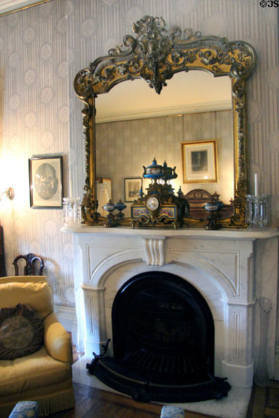 Bedroom with marble fireplace at Chateau-sur-Mer. Newport, RI.