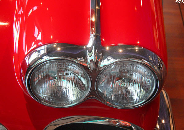 Double headlight of Chevrolet Corvette convertible (1960) at Audrain Automobile Museum. Newport, RI.