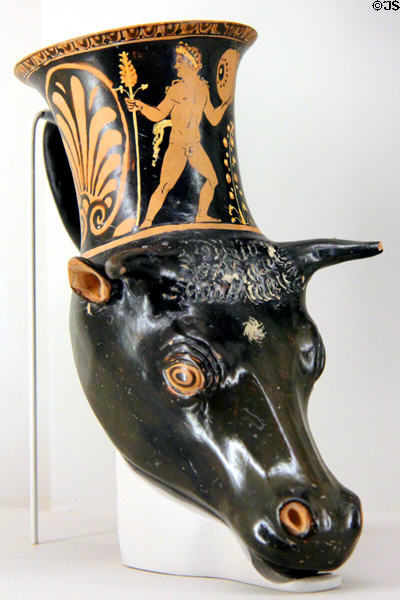 Greek terracotta red-figure drinking cup (rhyton) in form of bull's head (after 350 BCE) from Tarentum, Southern Italy at RISD Museum. Providence, RI.