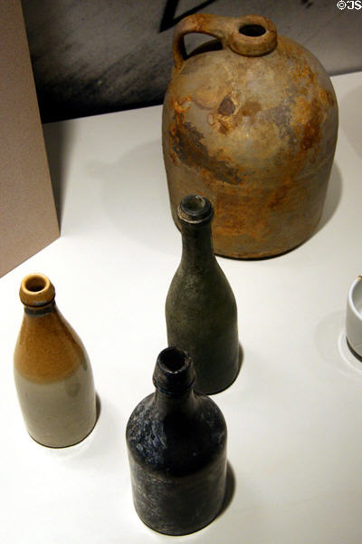 Glass bottles & stoneware jugs (1866-94) found at Fort Sully at South Dakota State Historical Society Museum. Pierre, SD.