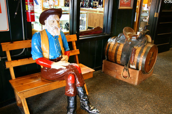 Cowboy statue sits in Wall Drug Store. Wall, SD.