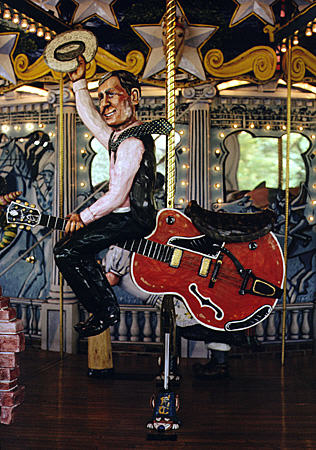 Chet Atkins character on Fox Trot Carousel honoring Tennessee greats. Nashville, TN.