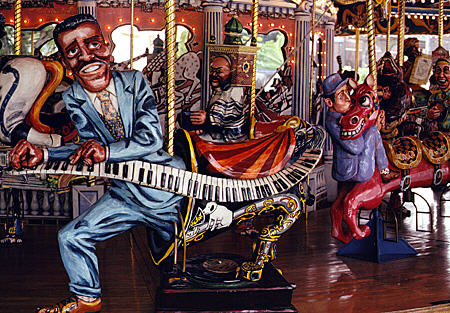 Leroy Carr on Fox Trot Carousel showing TN symbols by artist Red Grooms. Nashville, TN.