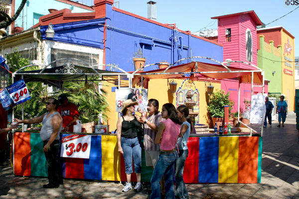 Colorful juice stand & buildings on Market Square. San Antonio, TX.