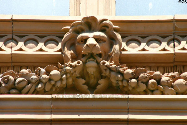 G. Bedell Moore building lion holding garland detail. San Antonio, TX.