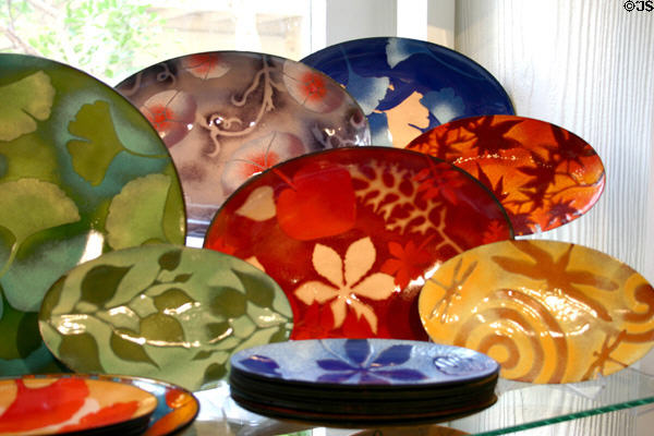 Plates with leaf designs by Makintosh Enamels of Chicago in Southwest Crafts Center. San Antonio, TX.